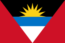 Antigua and Barbuda Courtesy Flag 12 x 18, featuring a yellow sun, blue triangle, marine-grade nylon, canvas header, and brass grommets. Made in the USA.