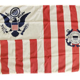 US Coast Guard Ensign Nylon Printed Flag 30 x 48 featuring a seal and anchor, made of 200 Denier Nylon with Header & Brass Grommets.