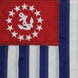 US Power Squadron Ensign Flag with a red canton featuring 13 white stars around an anchor, and 13 vertical blue and white stripes.