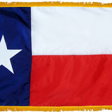 Texas State Flag 4' x 6' INDOOR Printed Nylon featuring a white star on a blue background, golden yellow fringe, flannel lined pole sleeve with Velcro tabs.