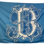 Blue flag with a white letter B, made of UV-resistant nylon, featuring brass grommets and a strong header, for custom SEWN applique designs.