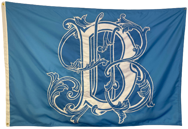 Blue flag with a white letter B, made of UV-resistant nylon, featuring brass grommets and a strong header, for custom SEWN applique designs.