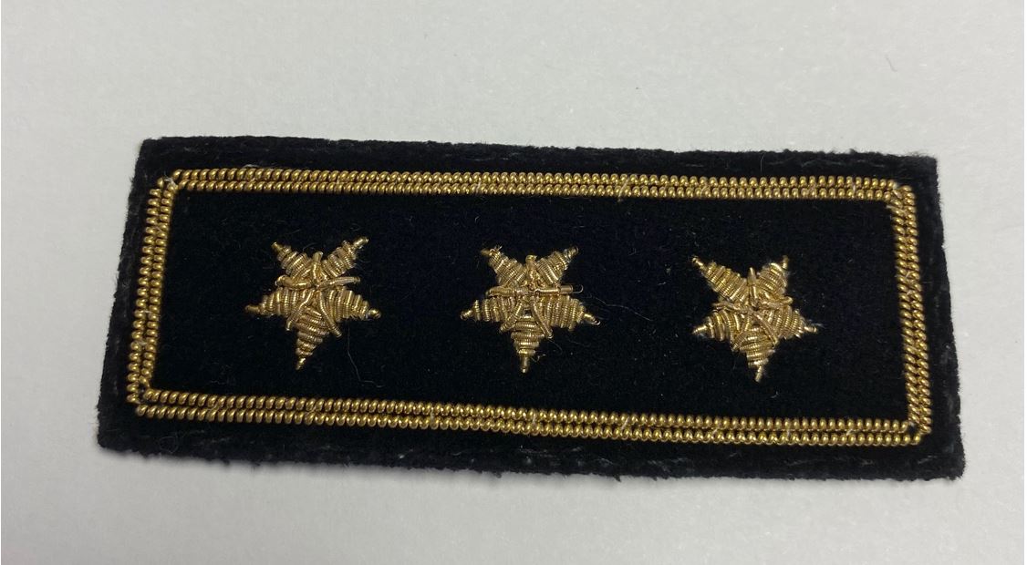 Commodore Yacht Club Officer Insignia Pin featuring three embroidered gold stars on black felt, outlined with gold bullion wire and secured by two pins with stays.