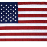 Close-up of an 8' x 12' American Flag - Nylon US Flag with embroidered stars and sewn stripes, showcasing detailed craftsmanship and durable materials.