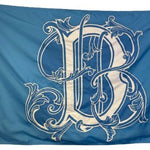 Custom SEWN Applique Wedding Flag featuring a blue and white design with a prominent letter B emblem.