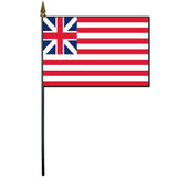 Grand Union Stick Flag 4 x 6 mounted on a 10.5 plastic stick with a gold spear finial, suitable for desktop display.