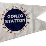 Custom SEWN Applique BURGEE featuring a white flag with a blue circle and red text, showcasing high-quality, hand-sewn nylon fabric.