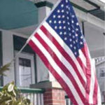 3' x 5' American Flag and Pole Kit featuring a 6' aluminum pole with a wall bracket, chrome ball top, and nylon flag with embroidered stars.