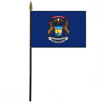 Michigan Stick Flag - 4 x 6 Desktop Flag: Blue flag featuring a coat of arms with two brown moose, mounted on a 10.5 plastic stick with a gold finial.