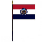 Missouri Stick Flag - 4 x 6 Desktop Flag, featuring a seal in the center, mounted on a 10.5 plastic stick with a gold spear finial.