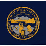 Nebraska State Flag 12 x 18 Printed Nylon, featuring a blue and yellow state seal, strong canvas header, and brass grommets for outdoor use.