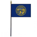 Nebraska Stick Flag - 4 x 6 Desktop Flag mounted on a 10.5 plastic stick with a gold spear finial, featuring bright colors and individually sewn edges.