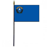 Nevada Stick Flag - 4 x 6 Desktop Flag showing a white star on a blue background, mounted on a plastic stick with a gold spear finial.