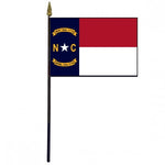 North Carolina Stick Flag - 4 x 6 Desktop Flag mounted on a 10.5 plastic stick with a gold spear finial, featuring individually sewn polyester edges.