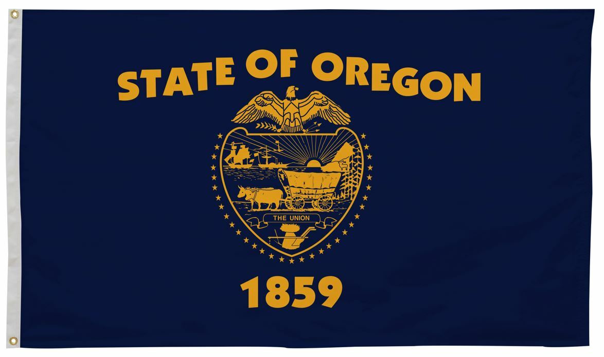 Oregon State Flag 6' x 10' Printed Nylon showcasing a blue field, yellow emblem with horse-drawn wagon, strong canvas header, and brass grommets for outdoor use.