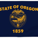 Oregon State Flag 6' x 10' Printed Nylon showcasing a blue field, yellow emblem with horse-drawn wagon, strong canvas header, and brass grommets for outdoor use.