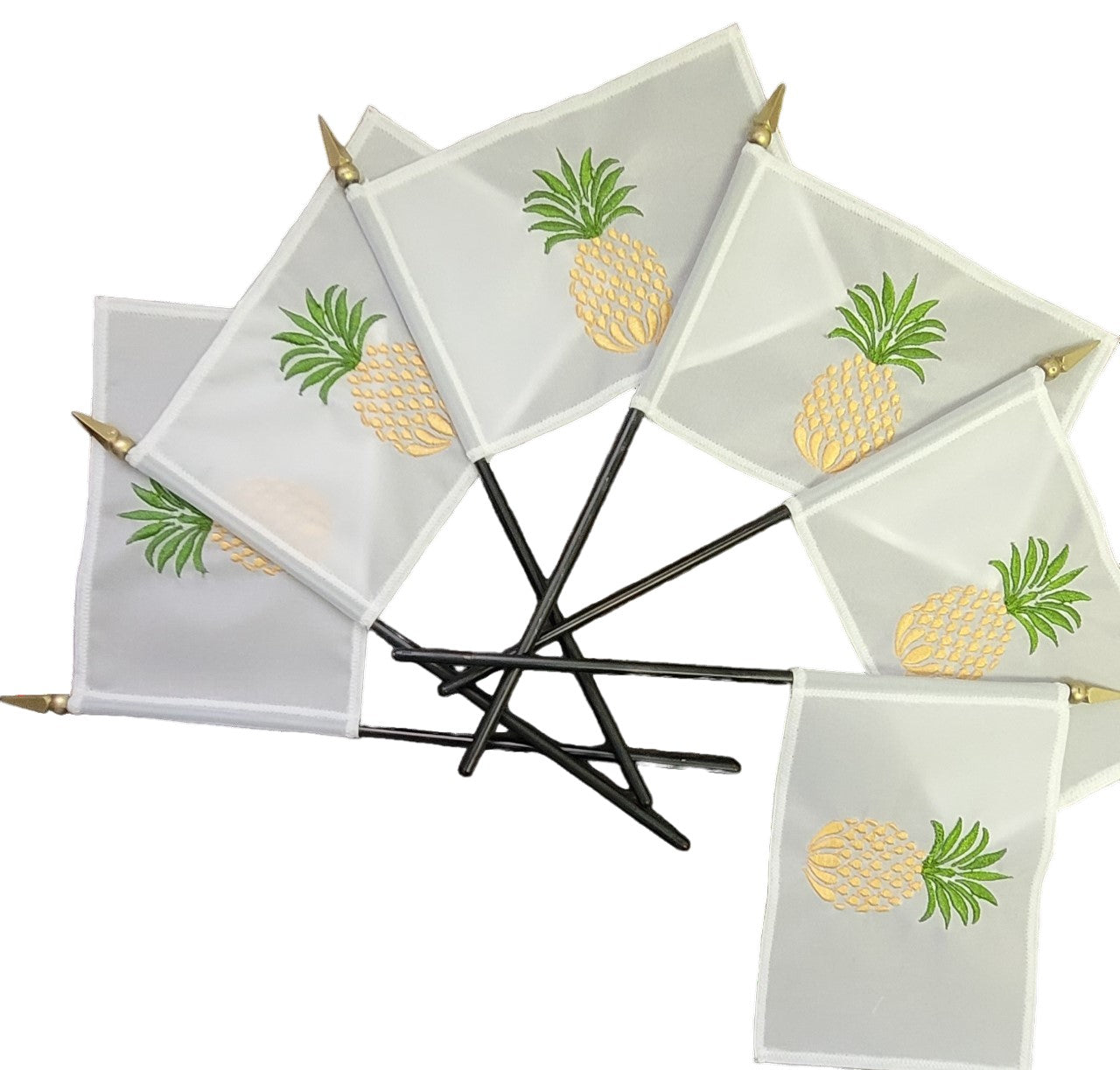 Custom Sewn and Embroidered 4 x 6 Stick Table Flags featuring pineapple designs, attached to black plastic staffs with gold tops.