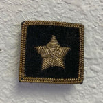 Rear Commodore Yacht Club Officer Insignia Pin with a gold star, hand-stitched on black felt, featuring embroidered bullion wire and a pin back.