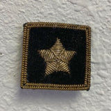 Rear Commodore Yacht Club Officer Insignia Pin with a gold star, hand-stitched on black felt, featuring embroidered bullion wire and a pin back.