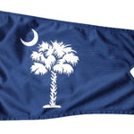 Custom PRINTED Nylon BURGEE featuring a white palm tree and crescent moon on a blue background, with a swallow tail and brass grommets.