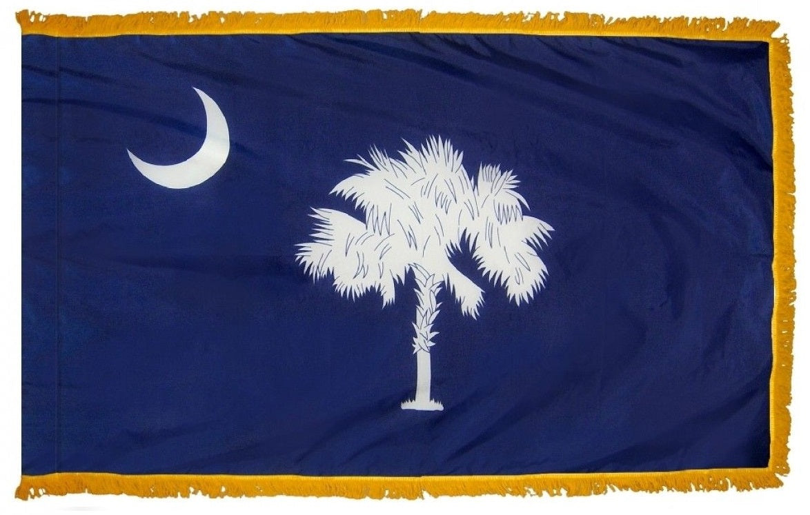 South Carolina State Flag 4' x 6' INDOOR Printed Nylon featuring a white palm tree and crescent moon on a blue background, with golden yellow fringe.