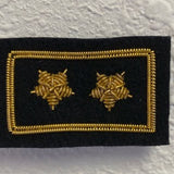 Vice Commodore Yacht Club Officer Insignia Pin with two gold stars, embroidered on black felt, featuring a hand-stitched bullion wire outline and a pin back.