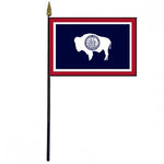 Wyoming Stick Flag 4 x 6 Desktop Flag featuring a buffalo symbol, mounted on a plastic stick with a gold spear finial.