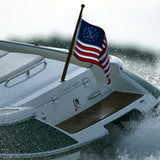 US Yacht Ensign Nylon Embroidered and Sewn Flag 16 x 24 displayed on a boat's stern, showing a fouled anchor within a circle of stars.